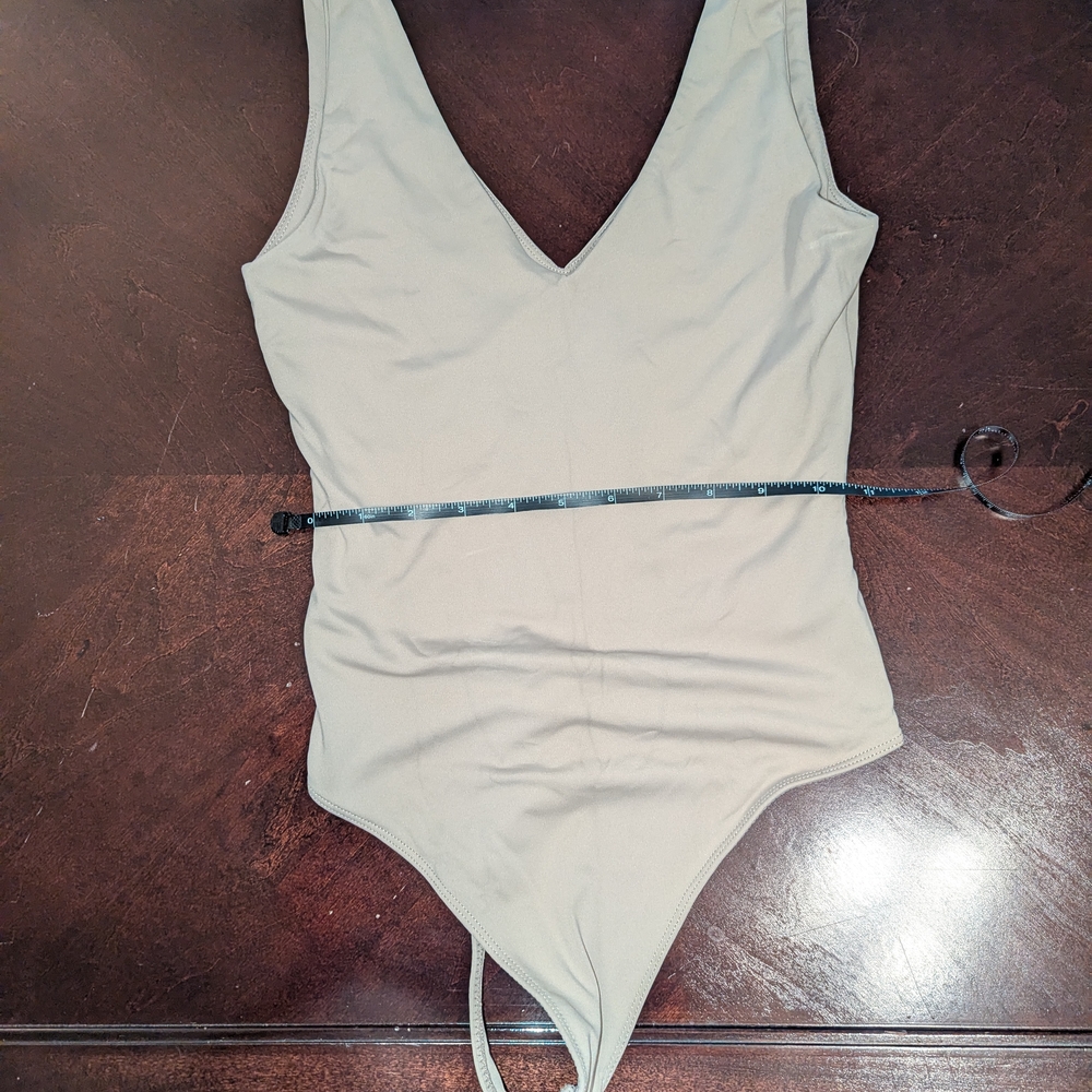 Beige One Piece Bodysuit